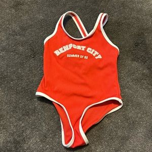 Adorable bathing suit.